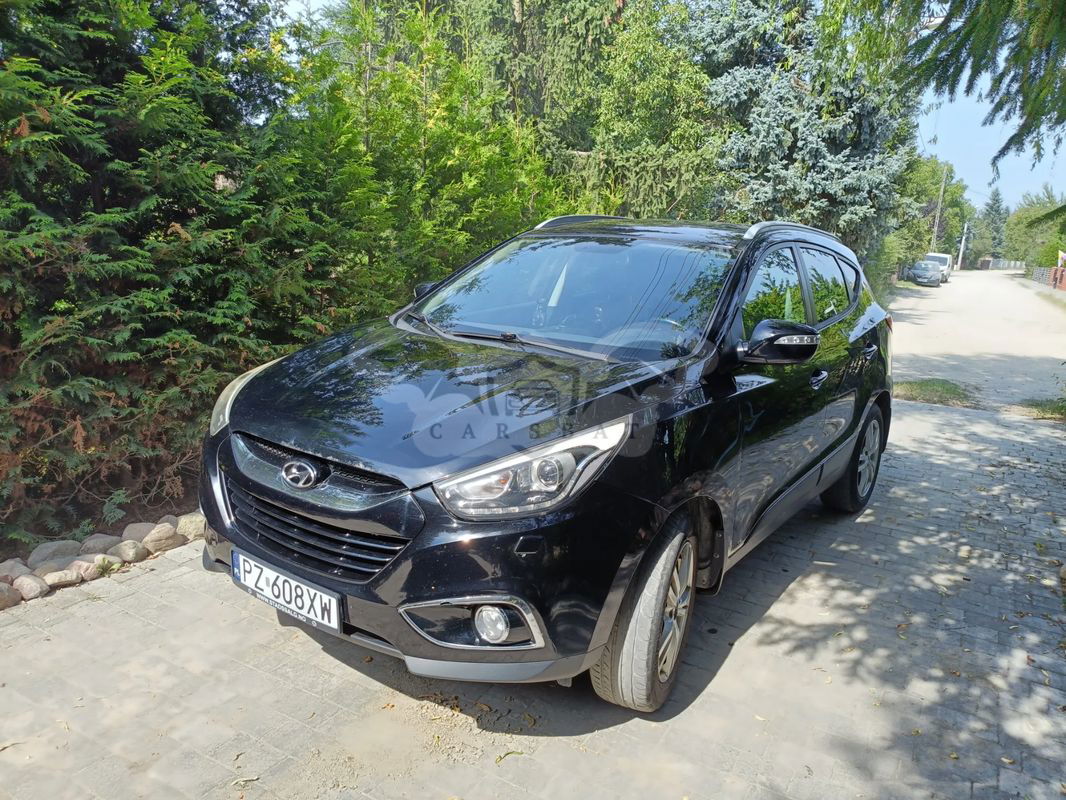 Hyundai Tucson II blue 1.7 CRDi 2WD Classic 2014